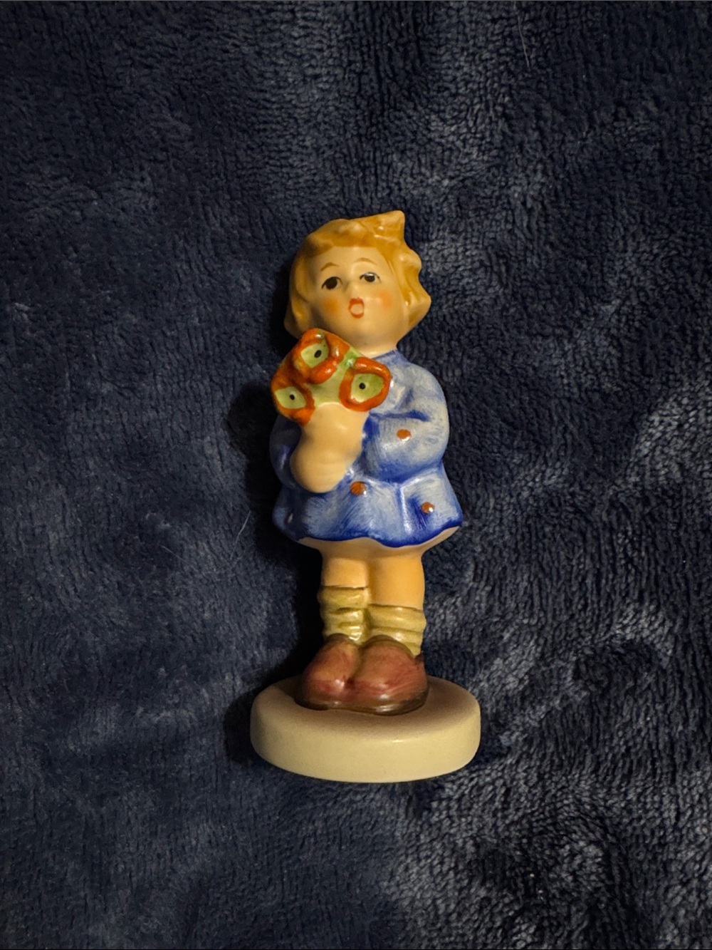 Hummel Figurine Girl in Blue Coat with Red Flowers 239A